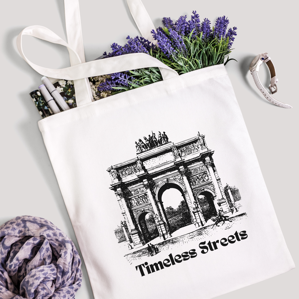 Timeless Streets tote filled with lavender stems and marker pens, leopard-print scarf below