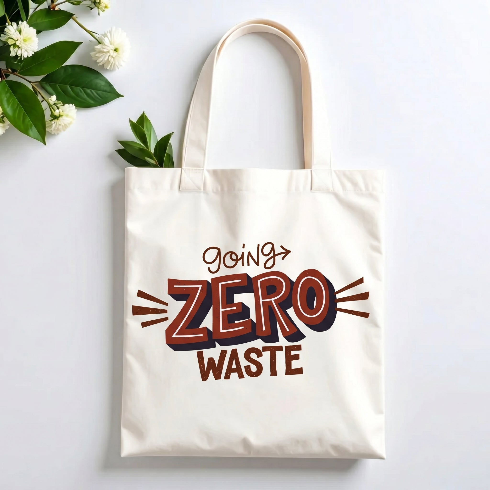 Plovera Co Going Zero Waste tote laid flat on pale grey with white blossom and green leaves